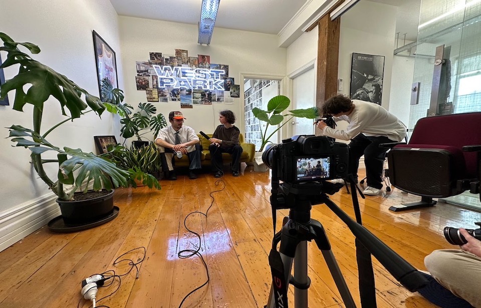 The Department of Information members interviewing Canadian rapper bbno$ for a story. Photo supplied by Louis Macalister. 